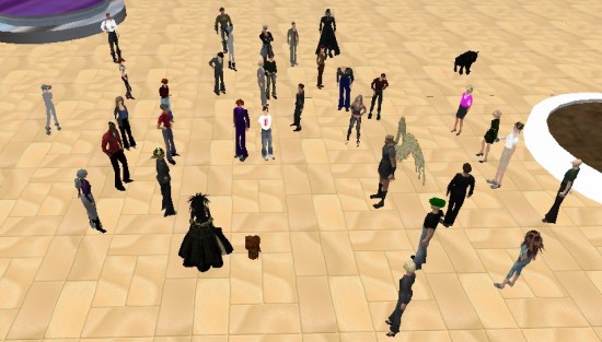 ReactionGrid COO Robin Gomboy (center, black dress) and CEO Kyle Gomboy (brown toaster to her right) speak at Train for Success in Second Life.