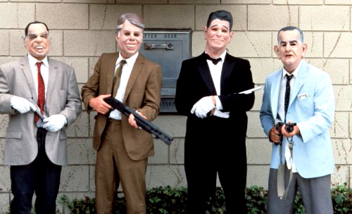 You can't always recognize criminals by their masks and guns. (Still from the movie Point Break.)
