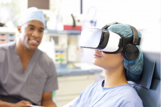 Patients wear a GearVR headset fitted with a hygienic liner. (Image courtesy AppliedVR.)