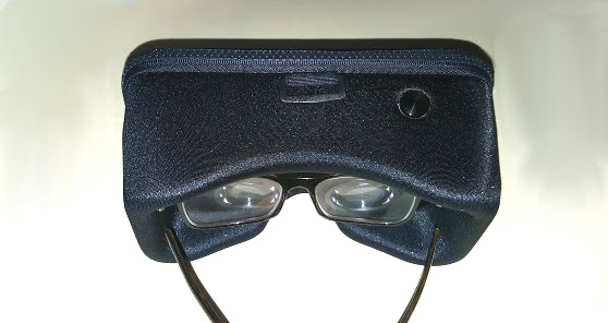 Xiaomi VR easily fits over glasses -- and has a control button on top.(Photo by Maria Korolov.)